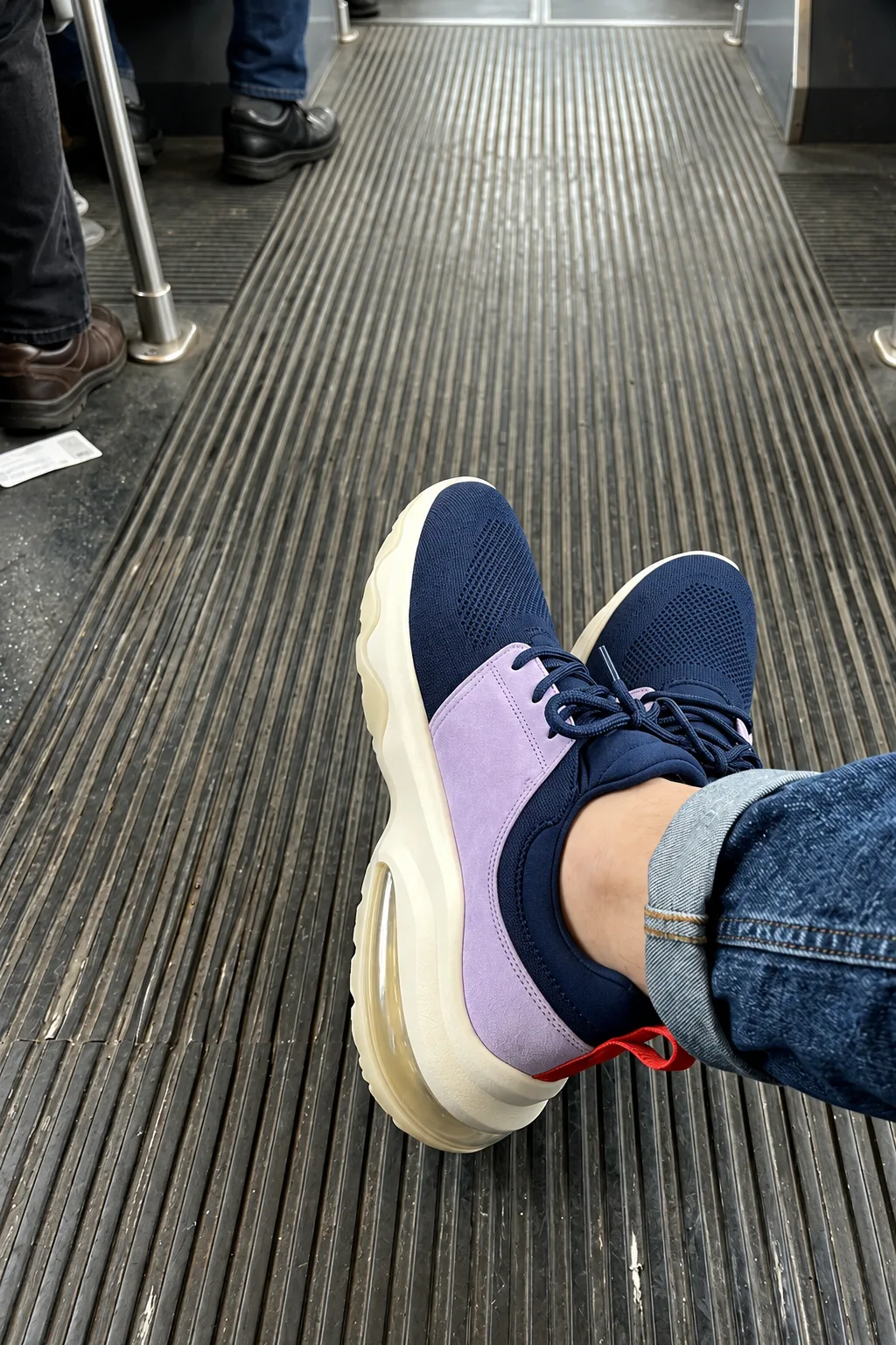 The Daily in Ink / Lilac on a tram floor